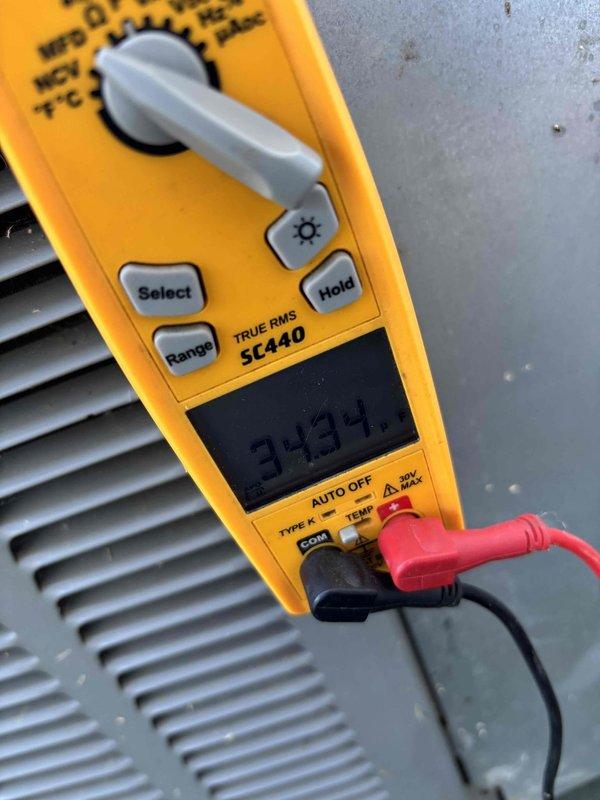 Completed platinum-level preventive maintenance on a 7-year-old single-system residential HVAC unit during the first scheduled visit. Performed comprehensive inspection of outdoor condensing unit, including removal of access panel to examine electrical components and capacitor operation. Verified proper capacitor function and electrical connections, with all wiring harnesses secure and properly routed. Measured and recorded amperage draw of 3.4 amps, which falls within normal operating parameters for the system. Cleaned interior surfaces of outdoor unit, removing accumulated dirt and debris from components. Inspected all accessible mechanical and electrical components for signs of wear or deterioration. Replaced 16x25x5 air filter as part of scheduled maintenance protocol. All system components operating within manufacturer specifications at time of service completion.