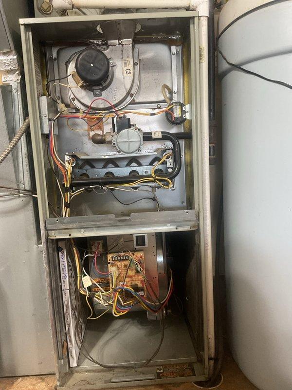 Completed second annual planned maintenance visit on Gold Level system with single HVAC unit under 10 years old. Performed comprehensive inspection of American Standard/Trane furnace system (Model TXC09BC4HPCD, Serial S293AVA95G, manufactured 6/2005), including full assessment of blower motor assembly, gas valves, burner assembly, heat exchanger coils, and all electrical connections. Verified proper operation of pressure switches, safety controls, and all system components. Documented equipment condition through photographic records showing clean internal components and proper installation. System operating within normal parameters and ready for continued service.