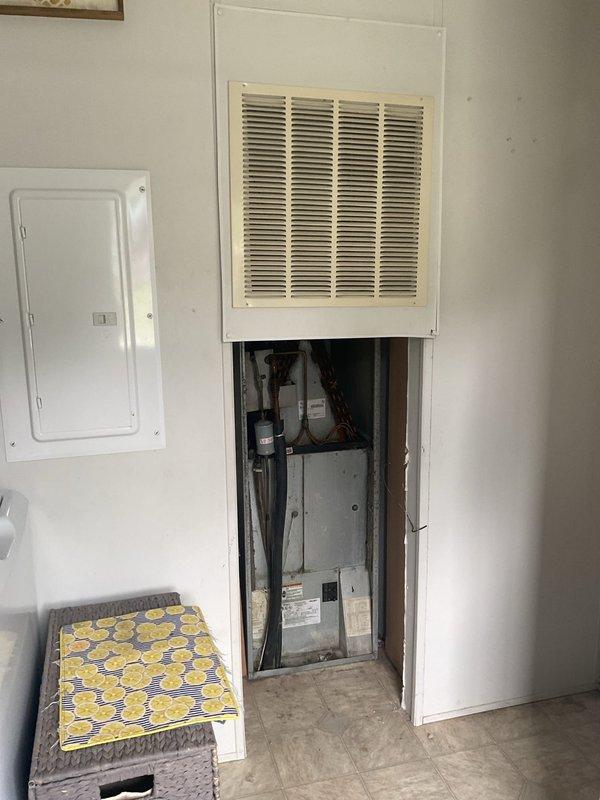 Conducted comprehensive HVAC system replacement estimate for residential property with existing functional cooling system. Evaluated outdoor condensing unit and indoor air handler installation, assessed current ductwork configuration and condition for potential replacement recommendations. Documented equipment specifications, spatial requirements, and existing infrastructure including refrigerant line routing and electrical service to provide complete system upgrade proposal.