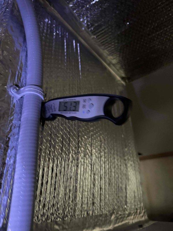 Completed annual planned maintenance service on a one-year-old HVAC system. Upon inspection, discovered significant ice buildup on the evaporator coil with temperatures reading 53°F, indicating a critical cooling system malfunction. Performed electrical diagnostics using a true RMS multimeter, recording a measurement of 4433, and documented the extensive frost formation throughout the air handler cabinet. Replaced the 20x20x5 filter and processed contract renewal as this was the second visit of the service agreement.