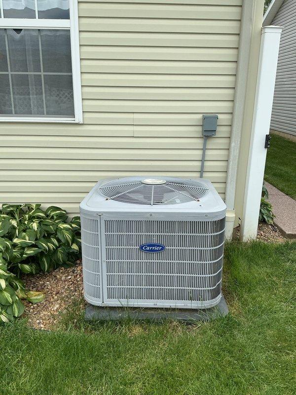 Completed annual Gold Level planned maintenance on 12-year-old Carrier air conditioning system. Performed comprehensive inspection of outdoor condensing unit, verified proper operation of all components, and documented equipment condition with warranty service sticker placement. Replaced 16x25x5 air filter and confirmed system is operating within normal parameters for first scheduled maintenance visit.