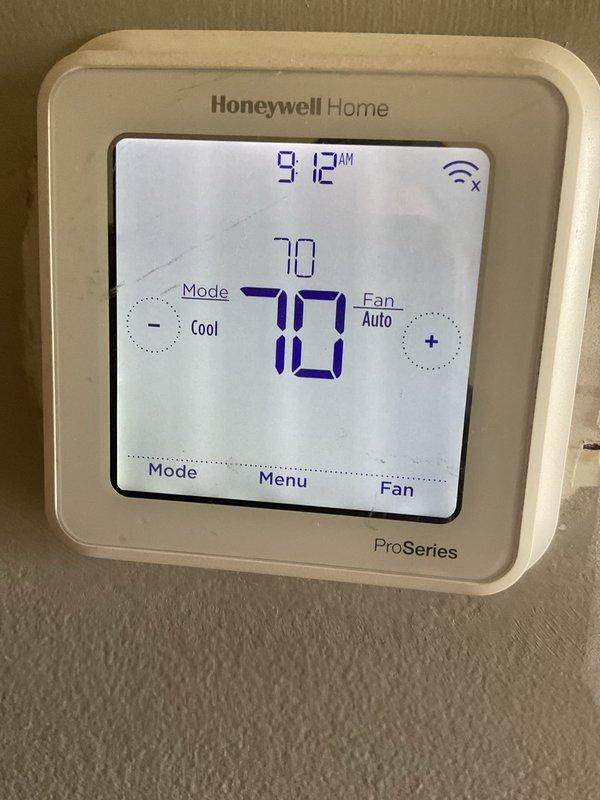 Completed monthly Platinum Level maintenance on a 5-year-old HVAC system. Replaced 16x20x5 air filter as part of routine preventive maintenance program. Inspected thermostat operation and verified proper temperature control settings with unit maintaining 70°F in cooling mode with fan set to auto. Accessed and inspected internal control panel, circuit board, capacitor, and electrical connections to ensure all components were functioning correctly with no signs of wear or damage.