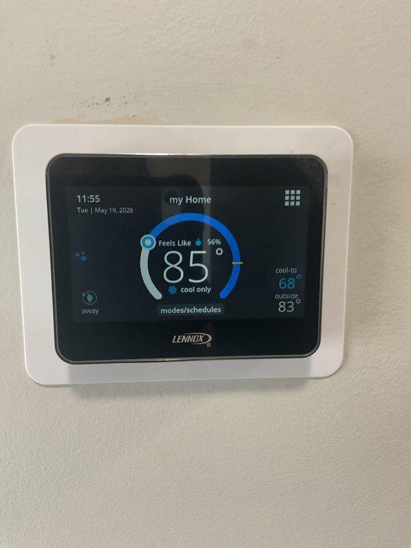 Responded to no-cool call on 11-month-old upstairs Lennox system. Upon arrival, found thermostat powered on and functioning normally, displaying 85° current temperature with system set to cool to 68°. Inspected air handler and discovered severely restricted airflow due to completely clogged 15x20x1 air filter. Removed and replaced dirty filter with new filter. Verified proper airflow restoration through supply vents and confirmed system cooling operation. System returned to normal operation with adequate airflow and proper cooling cycle.