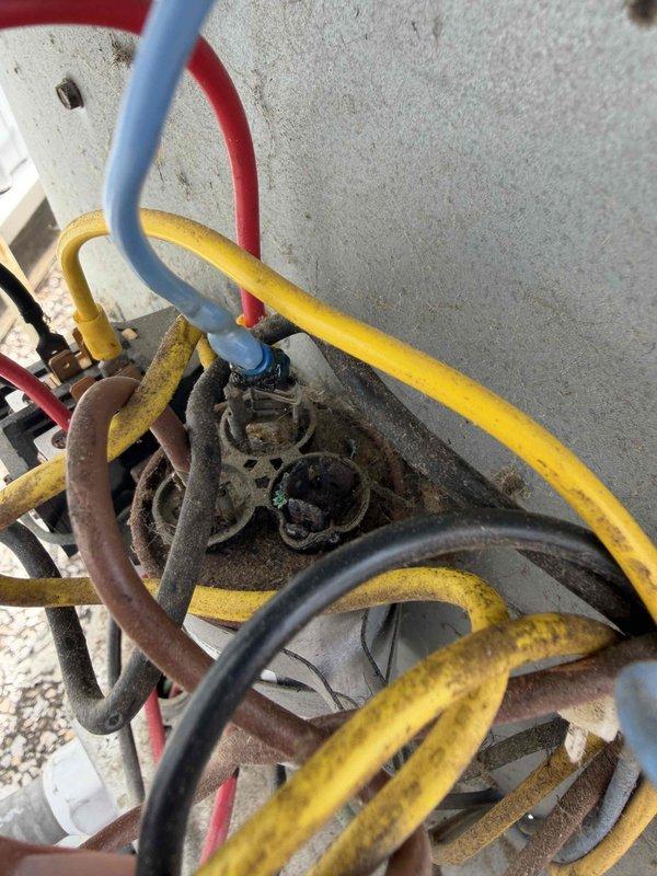 Responded to callback for system failing to maintain setpoint temperature of 71°F, with actual indoor temperature reading 75°F and inadequate air reconditioning. Upon arrival, performed comprehensive system diagnostics and refrigerant circuit inspection. Discovered severely corroded evaporator coil with extensive rust deterioration affecting heat transfer capability. Connected manifold gauges to service ports to verify refrigerant pressures and system performance. Documentation photos captured the advanced corrosion on copper tubing and coil assembly, showing significant oxidation that compromises thermal efficiency. The deteriorated condition of the evaporator coil is preventing proper heat absorption from the conditioned space, resulting in the inability to reach desired temperature setpoint. Recommended complete evaporator coil replacement due to extent of corrosion and system performance degradation. Provided customer with detailed findings and equipment condition assessment for ne