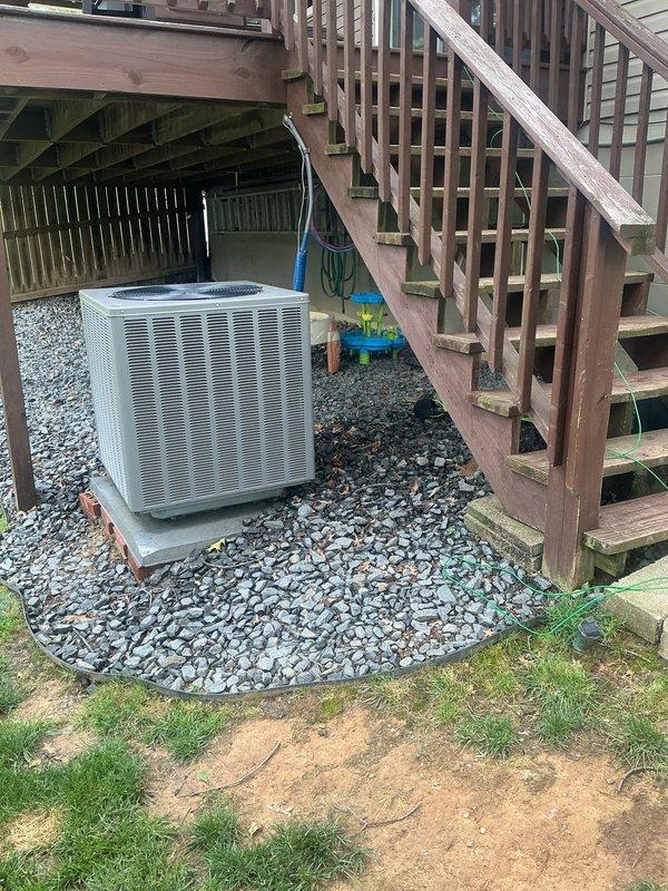 Responded to no cooling call on approximately 10-year-old residential HVAC system with thermostat set to 72°F but indoor temperature reading 80°F. Upon arrival, confirmed adequate airflow through supply vents with blower operational and no ice buildup present at indoor coil. Performed diagnostic evaluation of outdoor condensing unit located beneath deck structure and indoor air handler/furnace system in basement. Identified cooling system deficiency preventing proper temperature satisfaction. Completed necessary repairs to restore cooling capacity and verified system operation with proper airflow and refrigerant cycle functionality. System returned to normal cooling operation with thermostat achieving setpoint.