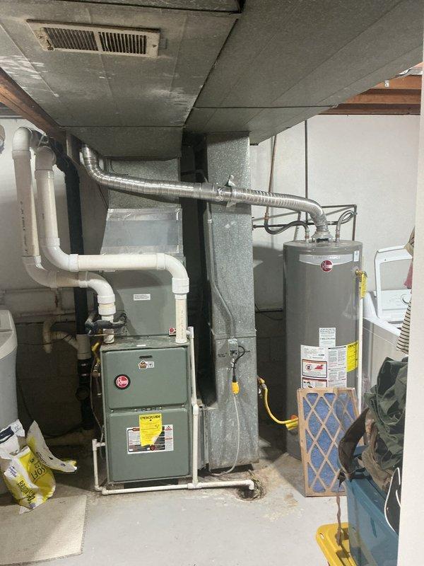 Responded to follow-up service call for 15-year-old system previously experiencing freezing issues. Upon arrival, system was blowing warm air and not maintaining setpoint, with thermostat reading 76°F while set to 70°F. Verified no breaker trips or visible ice buildup on evaporator coil. Performed refrigerant charge verification on outdoor condensing unit and indoor air handler. Checked system pressures, superheat, and subcooling values to ensure proper refrigerant levels following previous defrost. System operating within manufacturer specifications after charge confirmation.