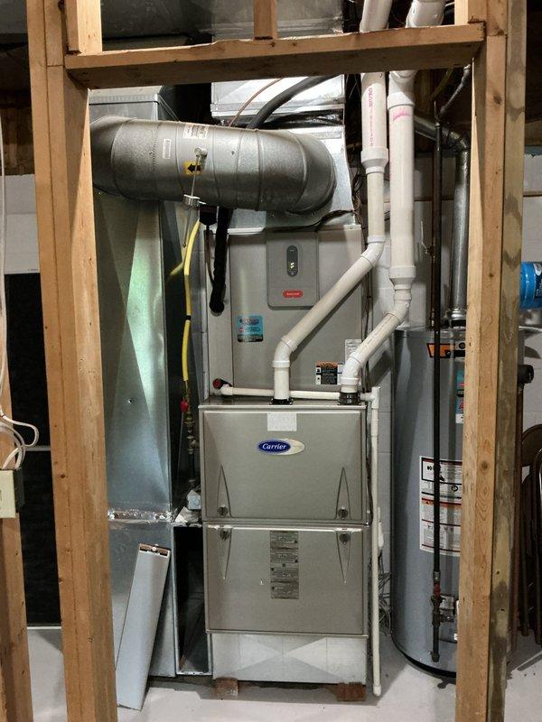 Completed second annual Gold Level planned maintenance visit on 11-year-old Carrier HVAC system. Performed comprehensive inspection of indoor furnace unit located in basement utility area and outdoor condensing unit, verified proper operation of all components, checked refrigerant levels, inspected electrical connections and control systems, examined condensate drain lines and PVC piping for proper drainage, and replaced 24x25x4 air filter. All equipment operating within manufacturer specifications with no issues identified at this time.