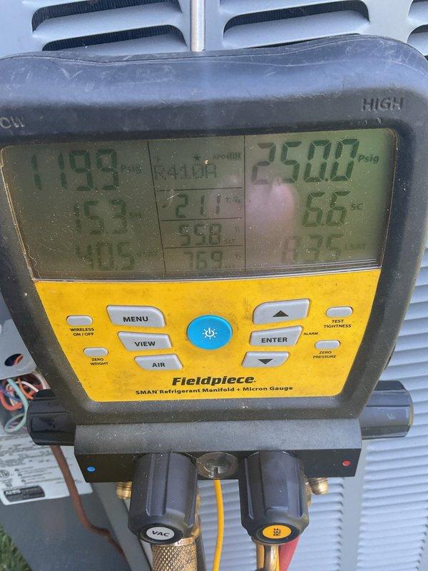 Responded to service callback for HVAC system with persistent issue. Performed diagnostic testing using refrigerant manifold gauge, which revealed abnormal pressure readings of 119.9 psi low side and 250.0 psig high side. Accessed outdoor unit electrical compartment and inspected control board, capacitor, contactors, and wiring connections. Identified need for defrost control board replacement, high and low pressure switch replacement, and Nest thermostat. System remains non-operational pending parts arrival and installation, estimated 2-hour repair time once components are received.