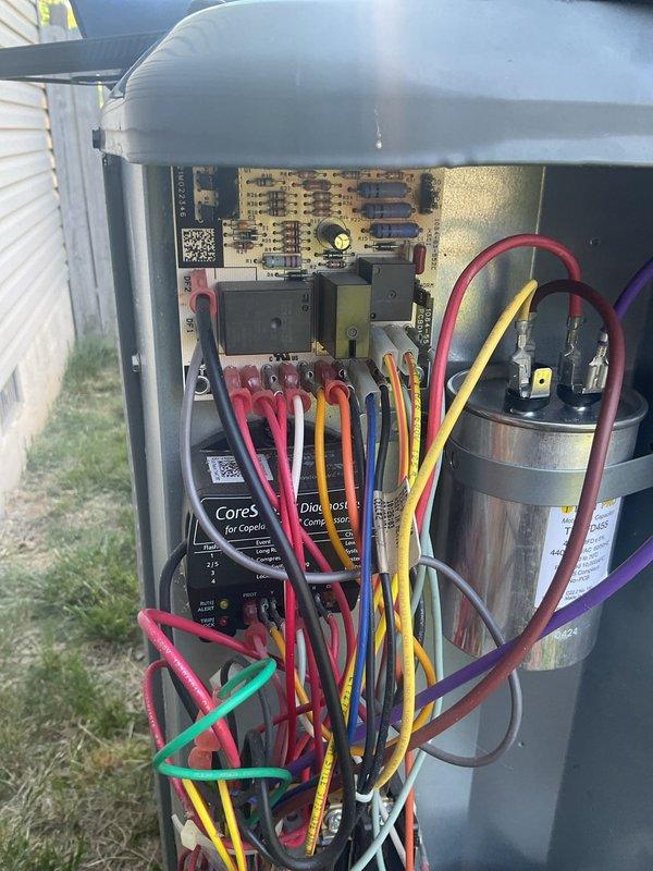 Responded to service callback for HVAC system with persistent issue. Performed diagnostic testing using refrigerant manifold gauge, which revealed abnormal pressure readings of 119.9 psi low side and 250.0 psig high side. Accessed outdoor unit electrical compartment and inspected control board, capacitor, contactors, and wiring connections. Identified need for defrost control board replacement, high and low pressure switch replacement, and Nest thermostat. System remains non-operational pending parts arrival and installation, estimated 2-hour repair time once components are received.