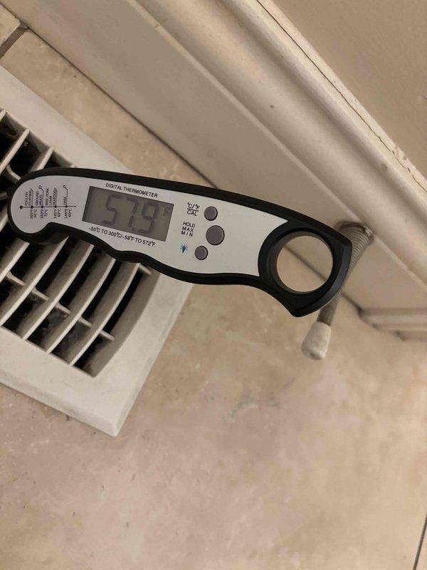 Completed annual Gold Level maintenance service on 8-year-old HVAC system during second scheduled visit. Performed comprehensive system inspection and diagnostics, measuring supply air temperature at 57.9°F at ceiling register and monitoring refrigerant line temperatures on insulated ductwork using calibrated digital instruments. Replaced 20x20x5 air filter and verified proper airflow throughout system. All equipment operating within normal parameters at time of service completion, with membership renewal processed and payment collected.