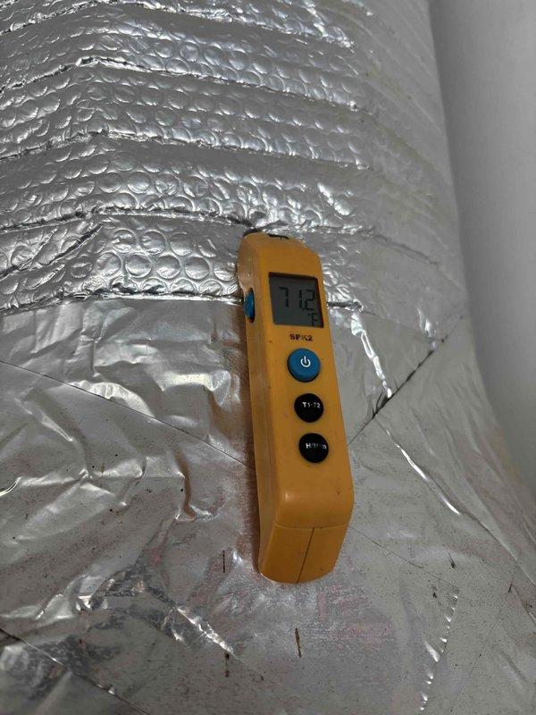 Completed annual Gold Level maintenance service on 8-year-old HVAC system during second scheduled visit. Performed comprehensive system inspection and diagnostics, measuring supply air temperature at 57.9°F at ceiling register and monitoring refrigerant line temperatures on insulated ductwork using calibrated digital instruments. Replaced 20x20x5 air filter and verified proper airflow throughout system. All equipment operating within normal parameters at time of service completion, with membership renewal processed and payment collected.