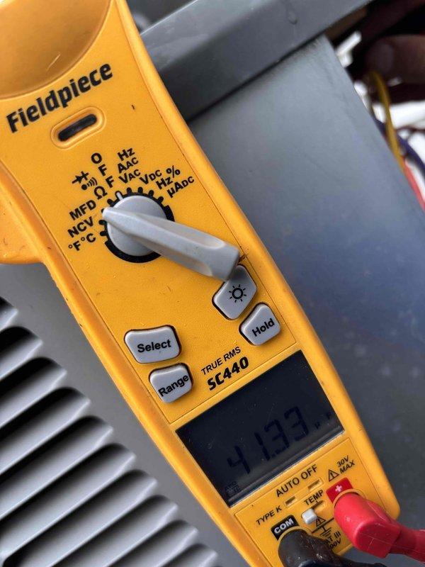 # HVAC Maintenance - Planned Single Maintenance

Completed comprehensive Gold Level annual maintenance on 8-year-old residential HVAC system with 20x25x5 filter configuration. Performed electrical diagnostics using Fieldpiece SC440 True RMS clamp meter, measuring system amperage and voltage readings to verify proper operation of compressor and blower motor. All electrical parameters tested within manufacturer specifications, with amp draw reading 50.3A indicating normal compressor operation under load. Inspected evaporator coil fins, condenser unit components, and verified refrigerant pressures. System operating efficiently with no deficiencies noted during first annual service visit.