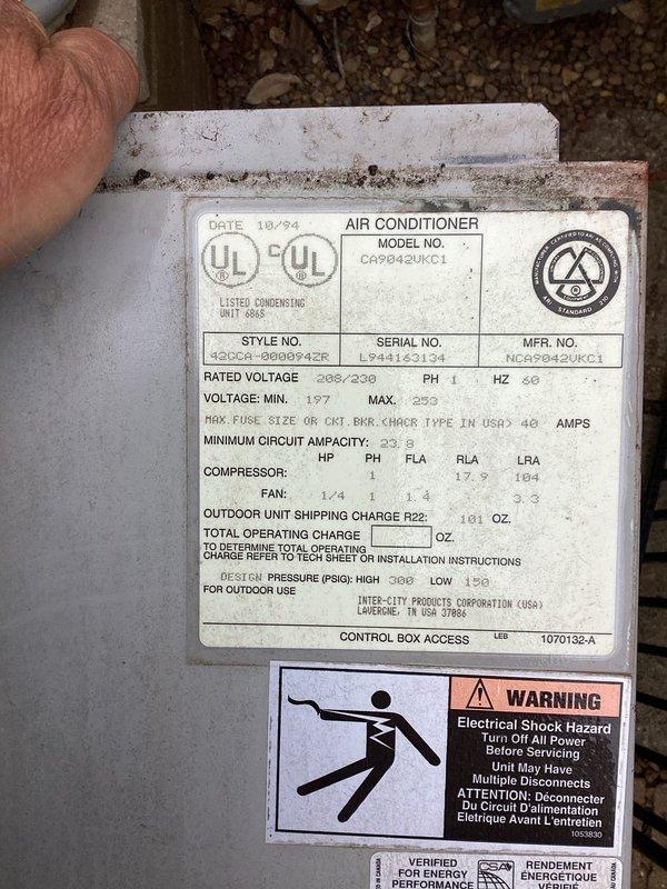 Completed second annual Gold Level maintenance visit on 24-year-old Carrier air conditioning system (Model CA9042UKC1, manufactured 10/94). Performed comprehensive inspection of outdoor condensing unit, verified electrical specifications and safety labels, documented unit condition with photos, and assessed system operation per planned maintenance protocol.