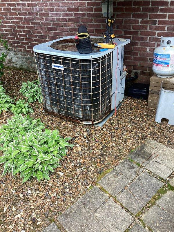 Completed second annual Gold Level maintenance visit on 24-year-old Carrier air conditioning system (Model CA9042UKC1, manufactured 10/94). Performed comprehensive inspection of outdoor condensing unit, verified electrical specifications and safety labels, documented unit condition with photos, and assessed system operation per planned maintenance protocol.