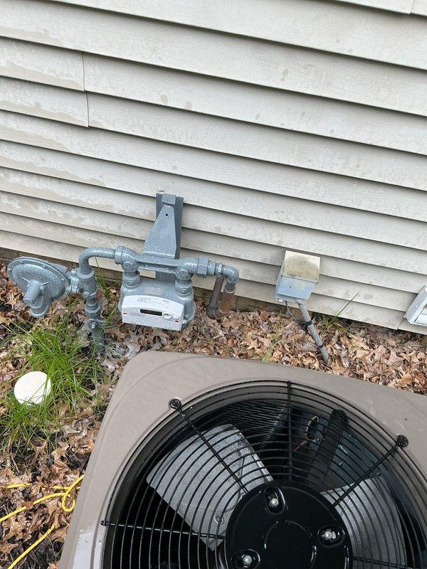 Responded to no-cooling complaint on 7-year-old residential AC system with warm air blowing from vents and fan operational. Performed diagnostic inspection of outdoor condenser unit and indoor components. Identified cooling system malfunction and completed necessary repairs to restore proper refrigeration cycle. Verified thermostat operation at 70° setpoint and confirmed adequate airflow through supply vents. System tested and returned to normal cooling operation upon service completion.