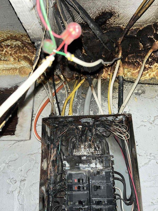 Conducted comprehensive HVAC replacement estimate for residential property with dual 2-ton system configuration. Assessed inoperable upstairs unit and evaluated existing infrastructure. Documentation revealed significant deterioration of ductwork with extensive rust and corrosion on metal components, compromised electrical service panel with heavy rust on mounting hardware and meter base, and aging utility infrastructure requiring attention. Photographed electrical panels, corroded HVAC ductwork, weathered meter base with rust damage, and multiple conduit entry points to document current system conditions. Recommended full system replacement due to equipment failure, infrastructure deterioration, and potential safety concerns with corroded electrical and mechanical components.