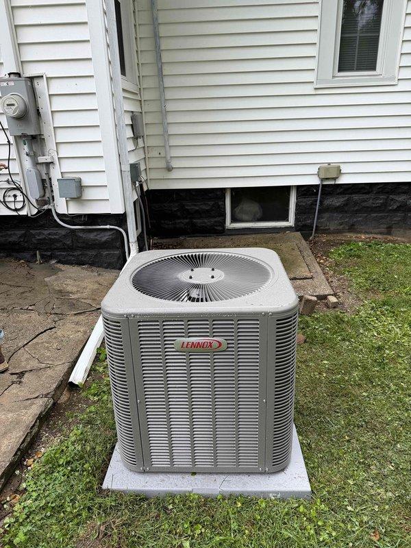 Completed full HVAC system installation including a 2.5-ton, 15.5 SEER air conditioning unit and 97% AFUE high-efficiency upflow furnace. Installed Lennox outdoor condenser on concrete pad with proper electrical connections and refrigerant line set, positioned new furnace system in basement utility area with complete white insulated supply ductwork distribution throughout residence, and verified all equipment operational per manufacturer specifications.