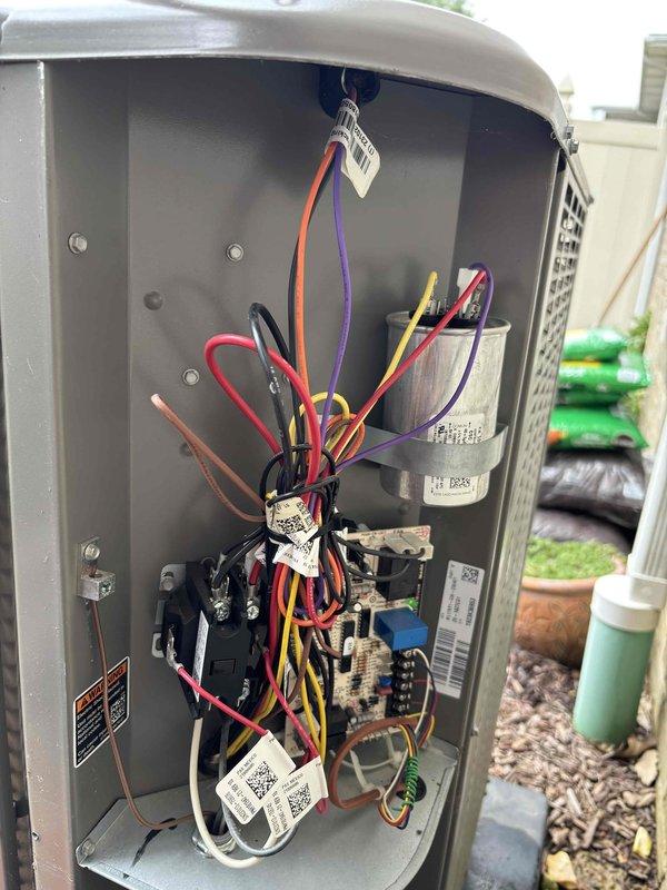 Completed annual planned maintenance visit for HVAC system including filter inspection and system diagnostics. Performed temperature differential measurements at supply register reading 49 degrees, indicating proper cooling performance. Conducted thorough inspection of outdoor unit electrical components, verifying all wire connections, contactors, and control board functionality were within normal operating parameters.