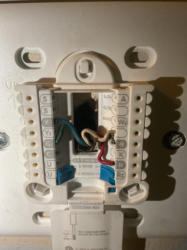 Completed comprehensive HVAC system replacement estimate at residential property. Evaluated existing thermostat wiring configuration, documenting multi-wire setup including C-wire, Y-compressor, G-fan, and auxiliary heat connections on current wall-mounted control system. Assessed compatibility requirements for new equipment installation and verified electrical connections using diagnostic testing equipment to ensure proper system specifications for replacement unit sizing and installation planning.