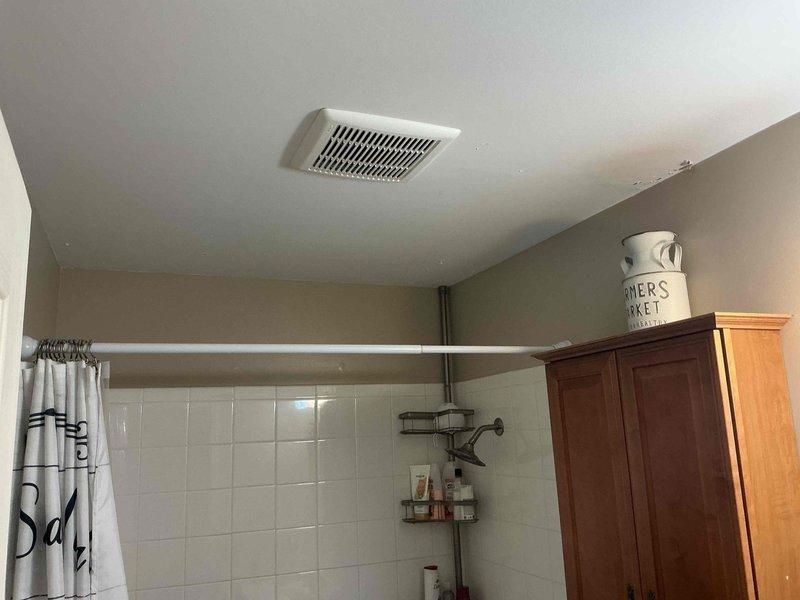 Replaced one standard exhaust fan unit and one combination fan/light fixture in two separate bathroom locations. Both units were successfully installed, ceiling-mounted, and tested for proper ventilation and illumination functionality.