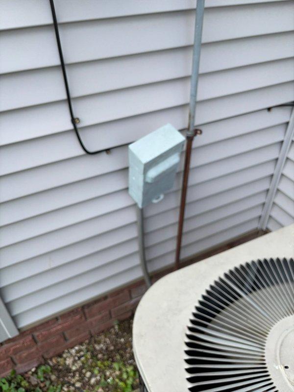 Responded to no cooling call on residential system aged 5-10 years. Upon arrival, verified system would not respond to thermostat calls for cooling, though unit could be manually forced on at equipment. Confirmed thermostat had been recently replaced by homeowner with issue persisting. Performed diagnostic evaluation of thermostat wiring and control circuit between indoor air handler and outdoor condensing unit. Identified faulty low-voltage wiring connection and control board communication failure preventing proper thermostat signal transmission. Repaired wiring connections, tested control board functionality, and restored proper communication between thermostat and HVAC equipment. Cycled system through multiple cooling calls to verify proper operation. System now responding correctly to thermostat commands with outdoor unit engaging on demand and delivering conditioned air through ductwork.