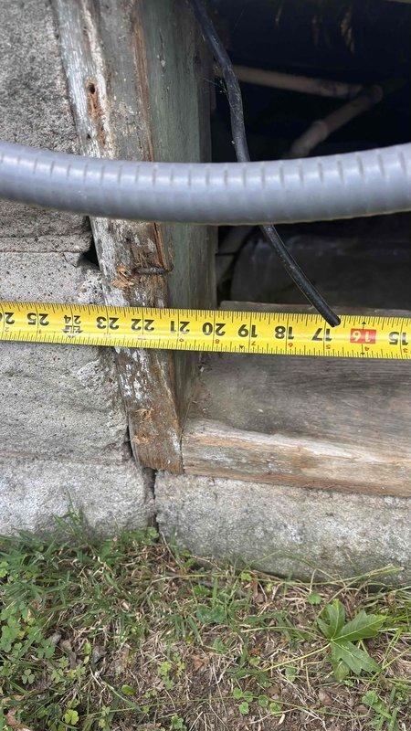 Provided estimate for temporary removal and reinstallation of main HVAC trunk line from crawlspace to allow foundation contractor access for repairs. Documented measurements and current configuration of flexible ductwork routing beneath structure, including approximately 15-19 inches of clearance requirements and connection points to existing system for proper reassembly upon completion of foundation work.