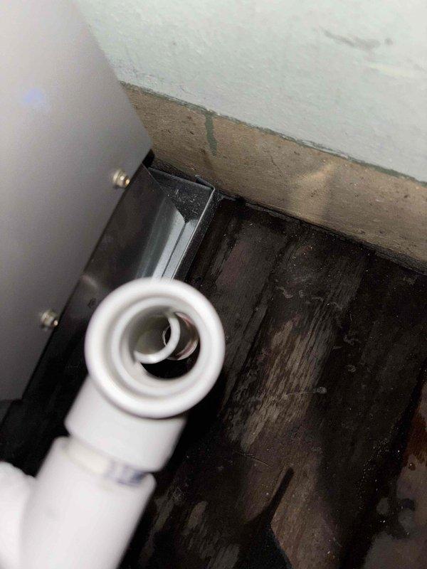 Responded to install callback for water leak at furnace location. Upon arrival, found evidence of water damage on floor near condensate drain assembly. Repaired separated PVC drain connection using appropriate adhesive and restored proper drainage function. Replaced air filter with temporary 1-inch filter as immediate solution. System tested and confirmed operational with no active leaking present.