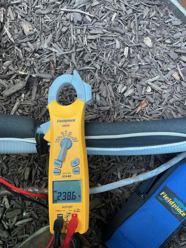 Completed Platinum Level Duo Maintenance on two-system HVAC setup. Serviced Lennox EL18KCV-048-230A01 unit manufactured 05/2023, performed comprehensive system diagnostics including amperage readings measuring 23.96A using calibrated clamp meter, replaced 20x25x5 filter on accessible system, verified proper electrical operation and refrigerant specifications per manufacturer ratings, and documented equipment conditions with unit operating within normal parameters.