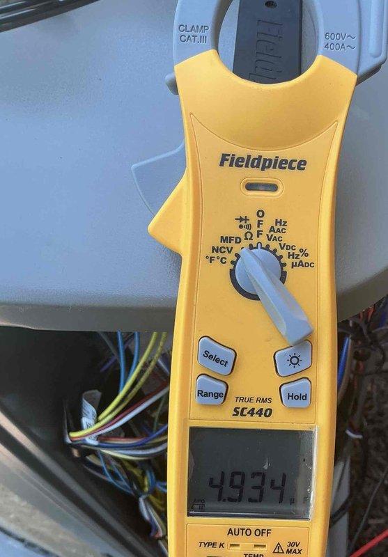 Completed annual Platinum Level maintenance on a 1-year-old single HVAC system during the first scheduled visit. Performed comprehensive inspection of the outdoor condensing unit, verified electrical amperage readings using calibrated clamp meter showing normal operating parameters at 4.934 amps, and replaced 20x25x5 air filter. All system components inspected and found operating within manufacturer specifications with no deficiencies noted.
