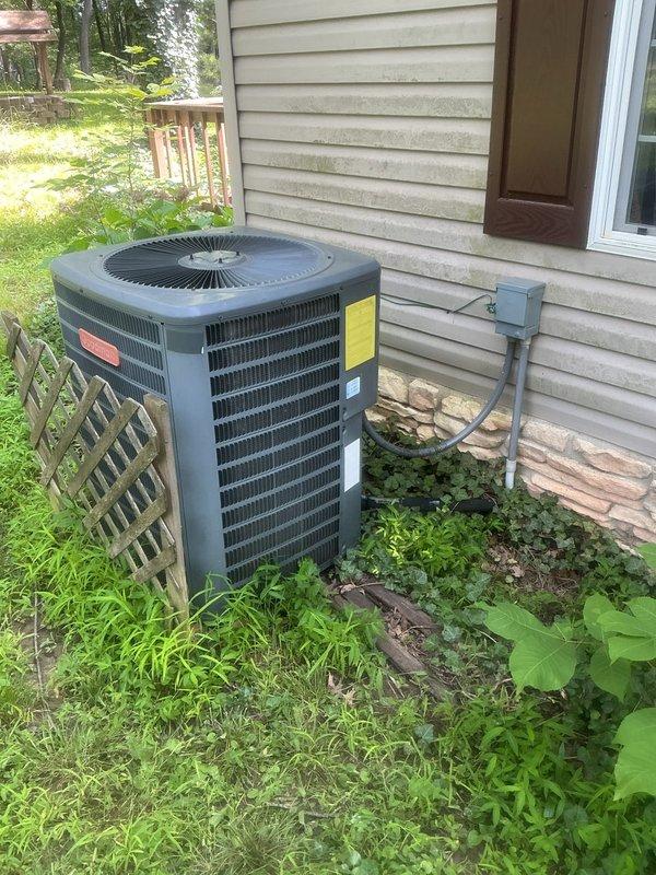 Responded to no-cool complaint on 11-year-old residential air conditioning system experiencing evaporator coil freeze-up and reduced cooling capacity. Upon arrival, confirmed ice buildup on indoor coil assembly near furnace area and diminished airflow from supply registers. Inspected outdoor condensing unit and indoor air handler components. Diagnosed frozen evaporator coil caused by restricted airflow due to severely clogged air filter. Allowed system to thaw completely before proceeding with repairs. Replaced dirty air filter with new high-efficiency filter. Verified proper airflow restoration across evaporator coil. Checked refrigerant pressures and confirmed system operating within manufacturer specifications. Cycled system through complete cooling cycle to verify ice formation eliminated and adequate cooling restored. Educated homeowner on importance of regular filter maintenance to prevent future freeze-up conditions.