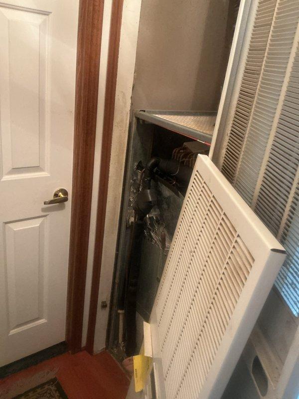 Responded to no-cool complaint on 11-year-old residential air conditioning system experiencing evaporator coil freeze-up and reduced cooling capacity. Upon arrival, confirmed ice buildup on indoor coil assembly near furnace area and diminished airflow from supply registers. Inspected outdoor condensing unit and indoor air handler components. Diagnosed frozen evaporator coil caused by restricted airflow due to severely clogged air filter. Allowed system to thaw completely before proceeding with repairs. Replaced dirty air filter with new high-efficiency filter. Verified proper airflow restoration across evaporator coil. Checked refrigerant pressures and confirmed system operating within manufacturer specifications. Cycled system through complete cooling cycle to verify ice formation eliminated and adequate cooling restored. Educated homeowner on importance of regular filter maintenance to prevent future freeze-up conditions.