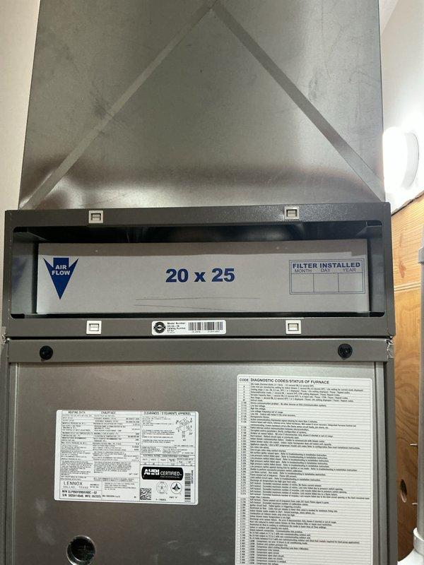 Completed first scheduled maintenance visit on HVAC system as part of 3-month service plan. Inspected air handler unit and replaced 20x25x5 air filter in accordance with maintenance schedule. Verified proper airflow direction and documented filter installation date on tracking label. Checked system operation and reviewed diagnostic codes on unit display panel, confirming all components functioning within normal parameters. Accessed smart thermostat (Model 1070SB-01) to verify system settings, software version 4.10.0143, and confirmed proper communication between thermostat and HVAC equipment. All equipment operating efficiently with no issues identified during this routine maintenance inspection.