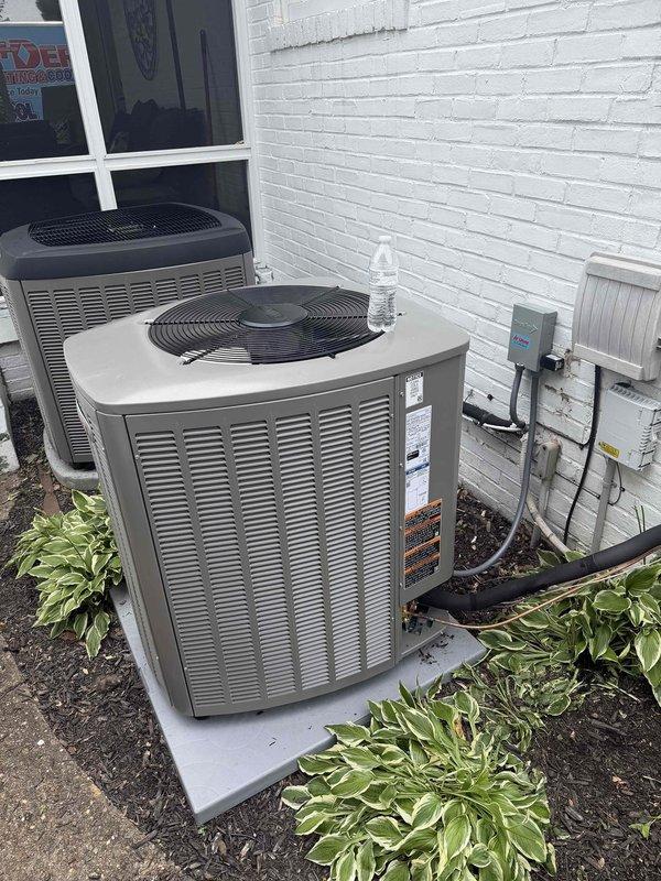 Completed installation of 2-ton, 19 SEER heat pump system in single-family residence. Installed new air handler unit in attic space on elevated platform with proper clearances, connected flexible ductwork throughout attic to existing distribution system, and ensured adequate insulation coverage around equipment. Positioned outdoor heat pump condenser unit on concrete pad against building exterior, established electrical connections via wall-mounted disconnect box, ran refrigerant lines and condensate drainage, and verified all components operational per manufacturer specifications.