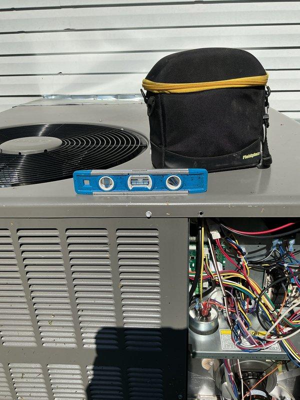 Completed Platinum Level annual maintenance on single-system HVAC unit with customer authorization to service outdoor equipment prior to arrival. Performed comprehensive inspection of outdoor condenser unit including electrical control board, capacitor, wiring connections, and fan assembly. Verified system level, inspected all electrical components and wire terminations, documented equipment condition with photos, and replaced 20x20x5 air filter. All components found operating within normal parameters and system left in proper working condition.