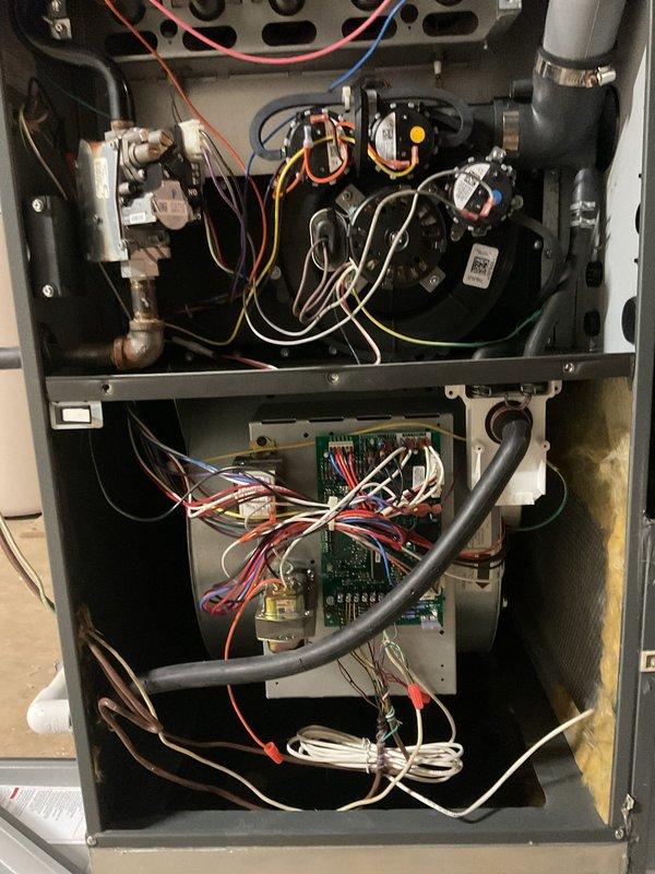 Completed routine annual air conditioning maintenance on a nine-year-old residential HVAC system prior to the cooling season. Performed comprehensive AC tune-up including inspection of furnace and air handler components, verified proper electrical connections and control board operation, checked refrigerant lines and fittings for integrity, and examined blower motor assembly and associated wiring. All mechanical and electrical components found to be in satisfactory operating condition with no deficiencies noted. System is ready for seasonal operation.