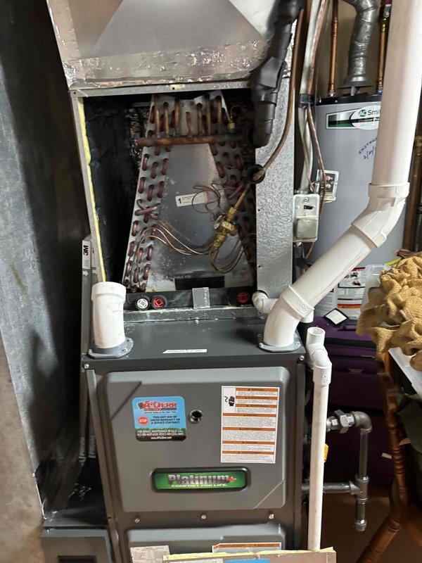 Completed planned maintenance visit on 4-year-old Platinum series furnace system with 16x25x2 polarized filter. Performed standard maintenance procedures including temperature diagnostics showing 159°F readings on refrigerant lines, inspected A-frame evaporator coil assembly noting visible corrosion on coil surfaces, and verified operation of all system components. Unit currently operational with all safety systems functioning properly.