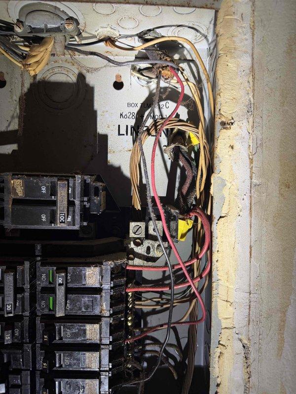 Responded to service callback for HVAC system with inadequate airflow following previous capacitor replacement. Upon arrival, performed comprehensive electrical system inspection and documented main electrical panel and circuit breaker configuration. Verified proper breaker operation for AC circuit, inspected wiring connections, and assessed power supply to HVAC unit to identify root cause of continued fan motor performance issues.