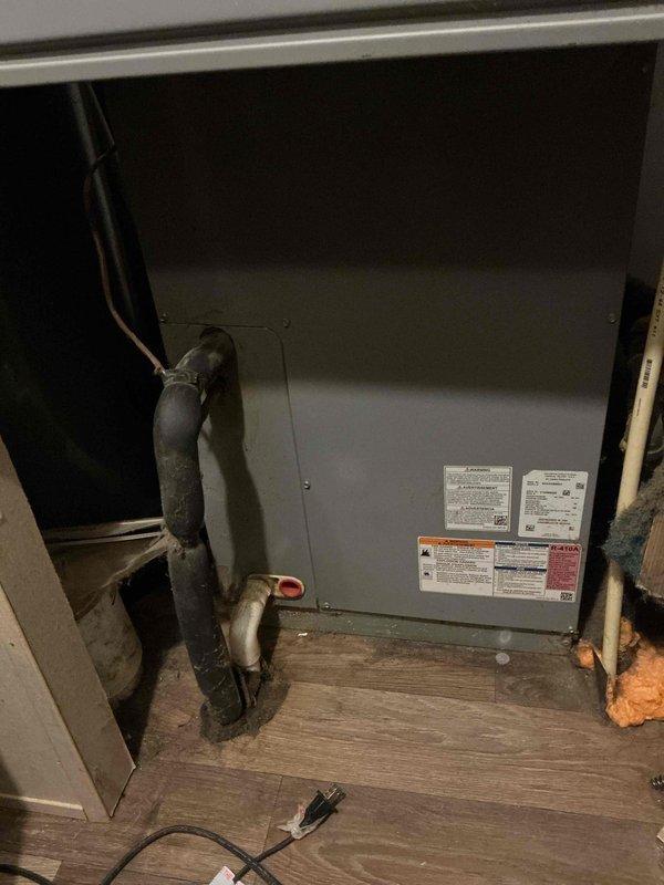 Responded to no cooling complaint on 6-year-old residential HVAC system running continuously but delivering warm air with thermostat set to 72°F and reading 74°F. Performed diagnostic evaluation of indoor air handler unit and associated components. Inspected electrical connections, circuit breakers, and control systems with no tripped breakers identified. Examined refrigerant lines, coil condition, and ductwork connections. Verified airflow through supply vents and confirmed no ice accumulation on evaporator coil or furnace components. Documented system installation configuration including air handler placement, return air plenum, and flexible ductwork routing in utility closet. Assessed overall system operation and identified cooling system malfunction preventing proper temperature control.
