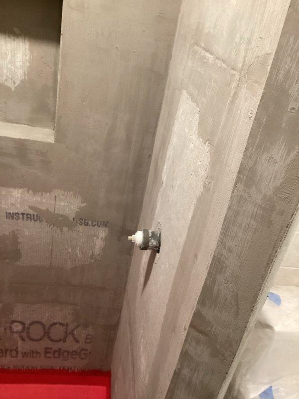 Completed installation of new PVC drain plumbing system under bathroom vanity, including P-trap assembly and connection to vertical drain line. All components were properly secured to floor joists with appropriate brackets and tested for proper drainage and leak-free operation.