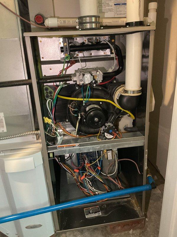 Completed Gold Level planned maintenance visit on single-system residential HVAC unit. Performed comprehensive inspection of furnace components including blower motor assembly, gas valve connections, burner chamber, and all electrical wiring throughout the system. Verified proper operation of all controls, checked refrigerant lines, and documented unit specifications from manufacturer data plate (Model 2620X14540). All components found operating within normal parameters, and unit interior and exterior photographed for service records.