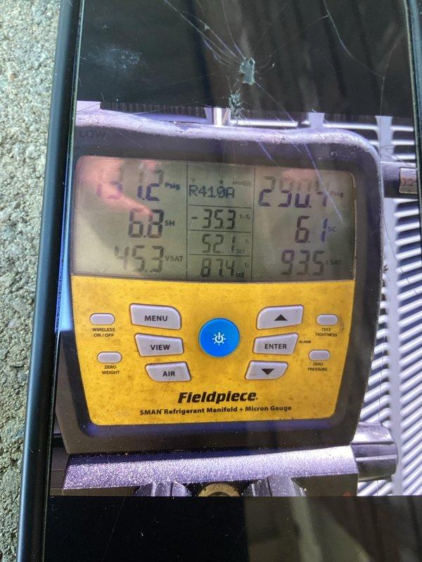 Responded to no cooling call on 6-year-old heat pump system with indoor temperature at 79°F and thermostat set to 70°F. Upon arrival, confirmed unit was completely shut down due to frozen outdoor coil as reported by homeowner. Conducted diagnostic testing using refrigerant manifold gauges on R-410A system to assess operating pressures, superheat, and subcool values. Identified system freeze-up condition affecting heat pump operation. Performed necessary repairs and system evaluation to restore proper cooling function to the residential heat pump and air handler unit.