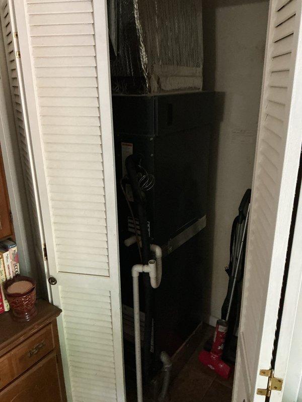 Completed monthly planned maintenance on 6-year-old Rheem HVAC system. Serviced indoor air handler unit located in utility closet and outdoor condensing unit positioned on concrete pad against exterior brick wall. Replaced 20x20x1 polarized air filter, inspected condensate drain lines and PVC piping for proper operation, and verified all electrical connections. Cleaned outdoor condenser coils, checked refrigerant levels, and confirmed fan motor operation on both indoor and outdoor units. System operating within normal parameters with no issues identified.