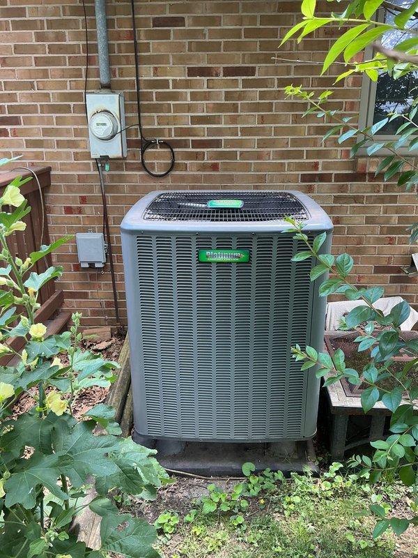 Completed monthly planned maintenance on 6-year-old Rheem HVAC system. Serviced indoor air handler unit located in utility closet and outdoor condensing unit positioned on concrete pad against exterior brick wall. Replaced 20x20x1 polarized air filter, inspected condensate drain lines and PVC piping for proper operation, and verified all electrical connections. Cleaned outdoor condenser coils, checked refrigerant levels, and confirmed fan motor operation on both indoor and outdoor units. System operating within normal parameters with no issues identified.