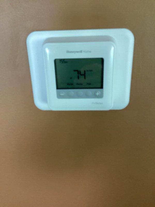 Responded to no-cooling call on 2-year-old Carrier split system (Model GA4SAN43000N, Serial 3723C24567). Upon arrival, confirmed unit blowing air but providing no cooling with no ice buildup present. Verified thermostat calling for cooling at 74°F setpoint. Checked warranty status showing unit under standard 5-year parts warranty from installation date. Documented system information and current operating conditions for diagnostic evaluation.