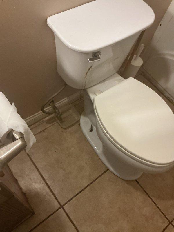 Responded to service call for toilet replacement at residential property with issues on two levels. Downstairs toilet exhibited instability due to potentially broken mounting bolts and had visible cracking at the base of the bowl, creating structural compromise and potential leak hazard. Upstairs toilet was improperly positioned too close to the wall, limiting accessibility and potentially violating clearance requirements. Performed comprehensive assessment of both fixtures, documented existing conditions including floor staining near downstairs unit indicating possible previous water intrusion, and evaluated feasibility of repositioning upstairs installation. Provided replacement recommendations for both toilets to address structural damage and improve fixture placement for proper clearances and code compliance.