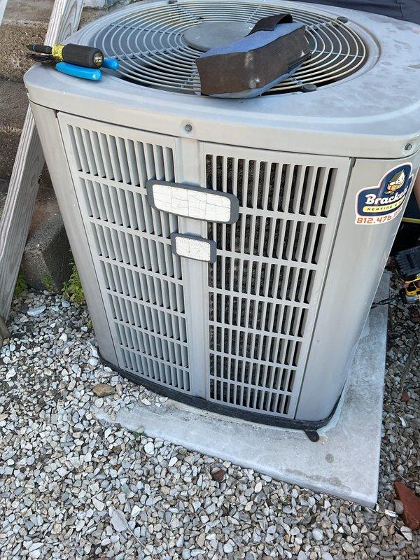 Responded to no cooling complaint on 15-year-old Bryant PLUS 90 system utilizing R22 refrigerant. Diagnosed low refrigerant charge as cause of inadequate cooling performance. Recharged system with R22 refrigerant to manufacturer specifications and verified proper operation of condenser unit and indoor air handler. System returned to normal cooling operation with no evidence of evaporator coil icing or other secondary issues.