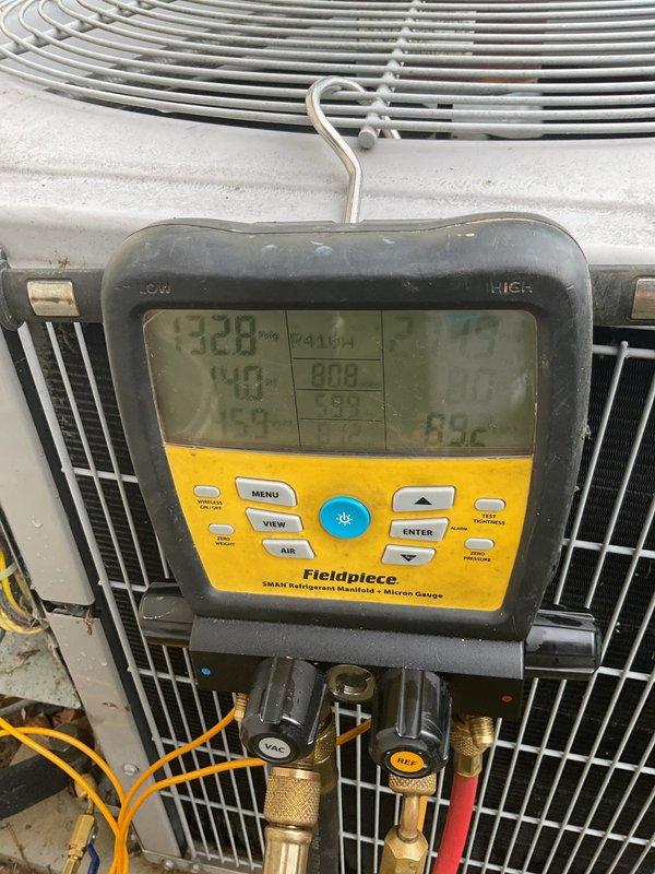 Responded to no-cool call on 13-year-old residential system where thermostat was set to cool but indoor fan would not activate. Upon arrival, confirmed no power to outdoor condensing unit and indoor blower motor inoperative. Performed comprehensive diagnostic testing using refrigerant manifold and micron gauge at outdoor unit. Tested electrical components including capacitor connections and contactor operation. Identified failed capacitor as primary cause of system failure, evidenced by lack of compressor and condenser fan motor operation. Replaced defective dual-run capacitor with proper MFD-rated component, reconnected all electrical terminals, and verified proper wire connections. Cycled system through complete operational test, confirmed compressor startup, verified condenser fan motor operation, and checked refrigerant pressures within manufacturer specifications. System restored to full cooling operation with all components functioning normally.