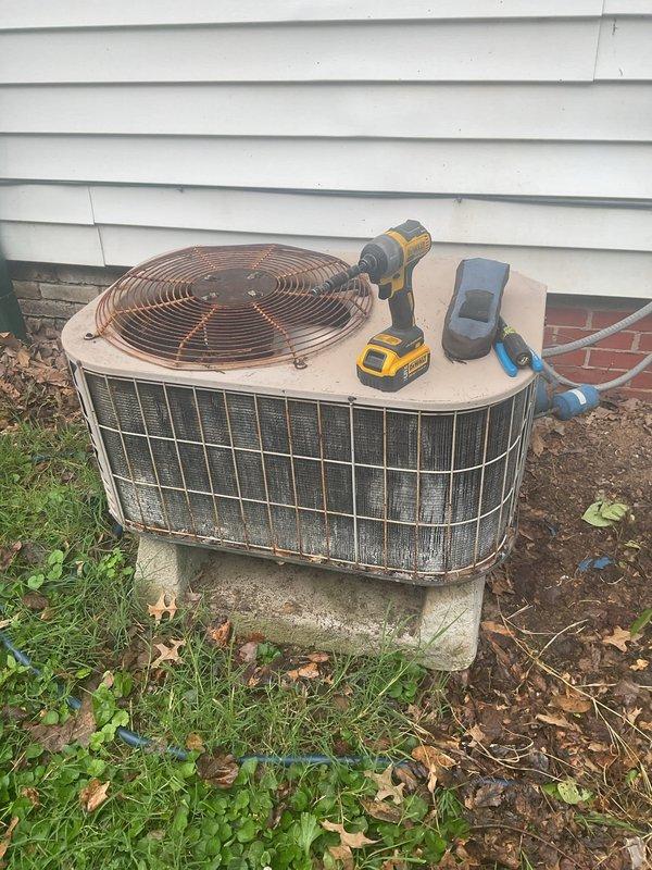 Responded to no cooling call on residential split system approximately 15+ years old. Upon arrival, system was already shut down due to customer-reported freezing and suspected refrigerant leak. Performed visual inspection of outdoor condenser unit and indoor furnace/evaporator assembly. Confirmed signs of ice accumulation and potential refrigerant loss. Conducted leak detection procedures and identified refrigerant leak requiring repair. Provided assessment of system condition given age of equipment and discussed repair versus replacement options with homeowner due to advanced age of unit and efficiency considerations for ongoing cooling needs.