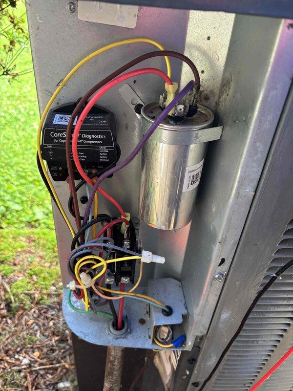 Completed Platinum Level planned maintenance on 7-year-old HVAC system during annual second visit. Replaced 20x25x2 air filter, performed comprehensive system inspection, and tested electrical components including capacitor voltage readings which measured 94.35V using digital multimeter. Inspected condenser unit's internal components including CoreSense diagnostic module and compressor diagnostics system, verified all electrical connections and wiring were secure and functioning properly. System operating within normal parameters with no issues identified.