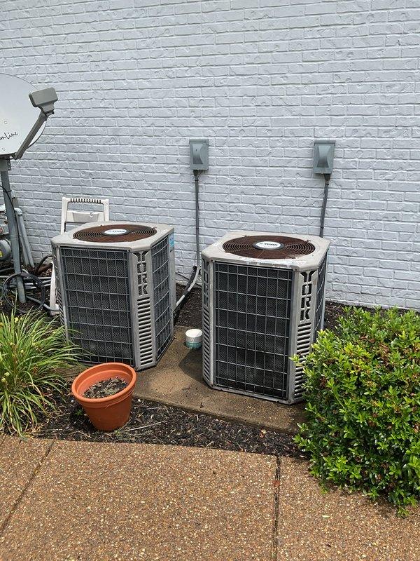Responded to no cooling complaint on 21-year-old dual York system with thermostat set to 70°F and indoor temperature at 77°F. Performed diagnostic evaluation on both outdoor units, completed load calculation showing required cooling capacity of 4.8 tons per system with 51,124 BTUh cooling load and 1,901 CFM airflow requirements. Given the age of the equipment and system performance issues, discussed replacement options and maintenance plan enrollment to restore proper cooling operation.